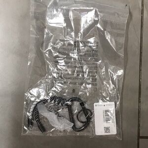 Lululemon Brand New Black and White “You Hold The Keys Keychain 2.0”